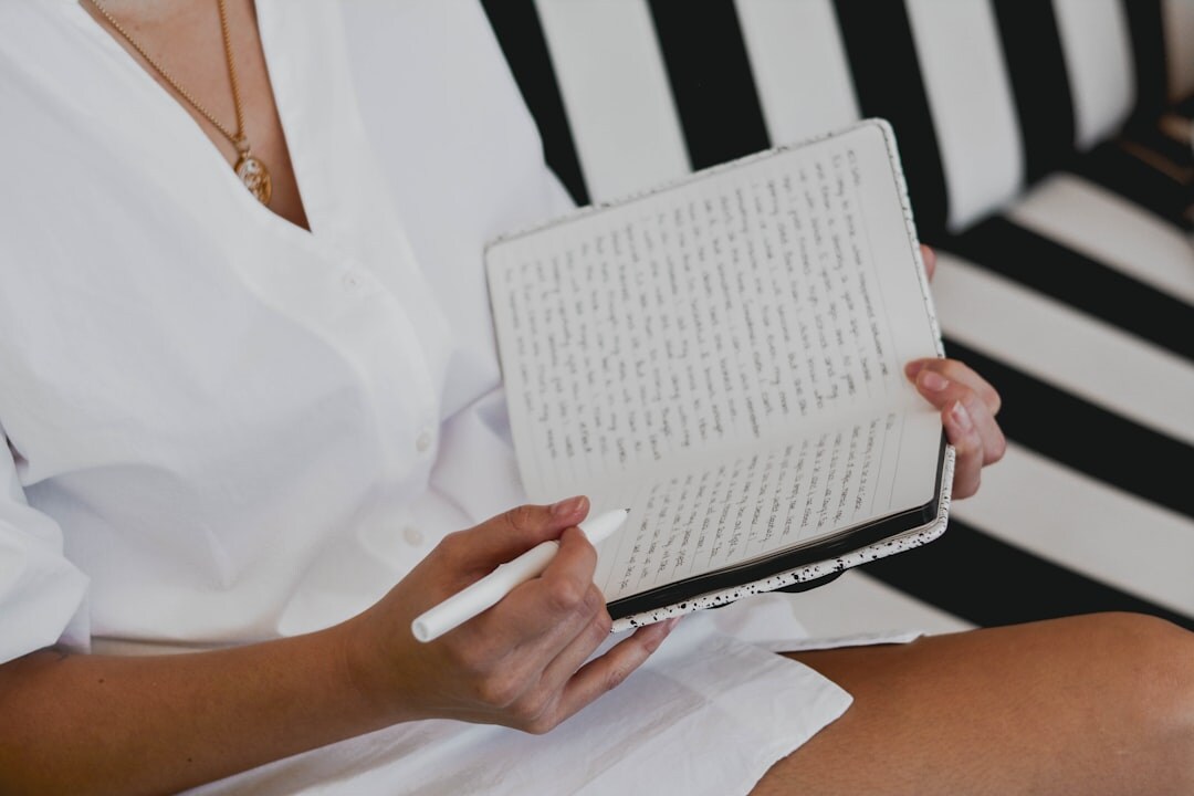 person reflecting on personal growth journal